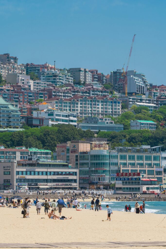 pexels-photo-31926713-31926713 Experience the bustling beach and cityscape of Busan, South Korea, a premier summer tourism destination.